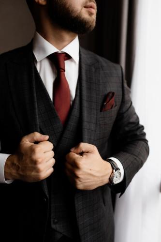 bearded-man-stylish-tuxedo-red-tie-strong-man-s-hands